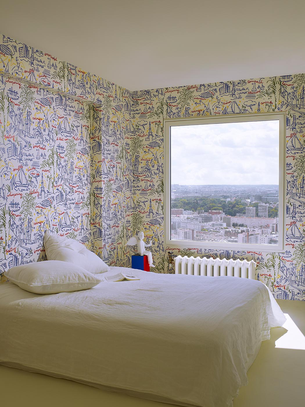 Le Voyage Eternel Wallpaper by Pierre Frey shown in a room setting (view 1)