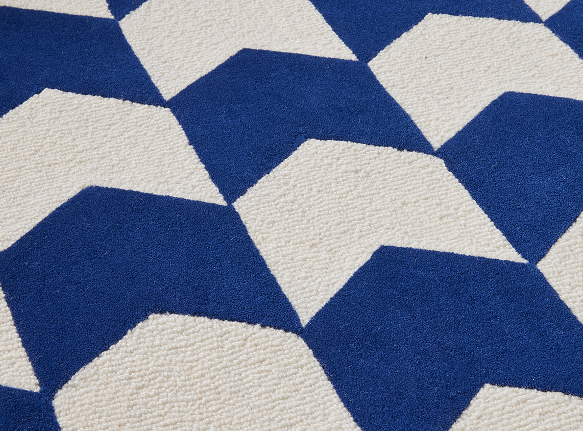 Les Fleches Rug by Le Manach shown in a room setting (view 2)