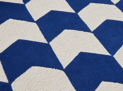 Les Fleches Rug by Le Manach shown in a room setting (view 2)