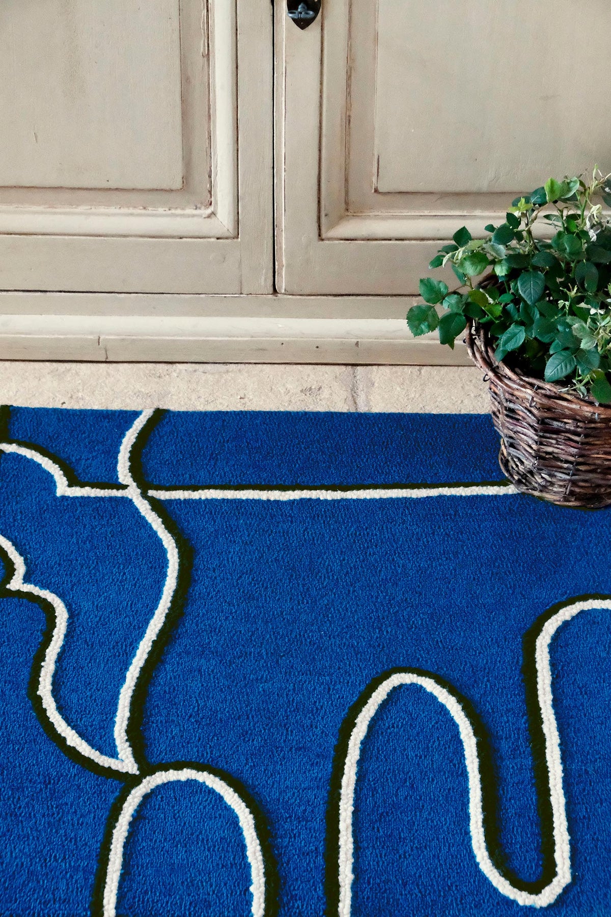 Les Mouettes Rug by Pierre Frey shown in a room setting (view 2)