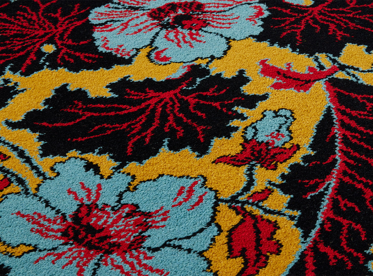 Les Pavots Axminster Rug by Braquenié shown in a room setting (view 1)