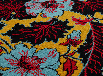 Les Pavots Axminster Rug by Braquenié shown in a room setting (view 1)