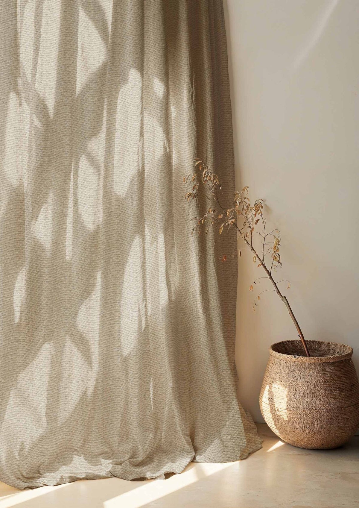 Lightweight Linen fabric by Coordonné in Brown T6484006, shown in a styled room