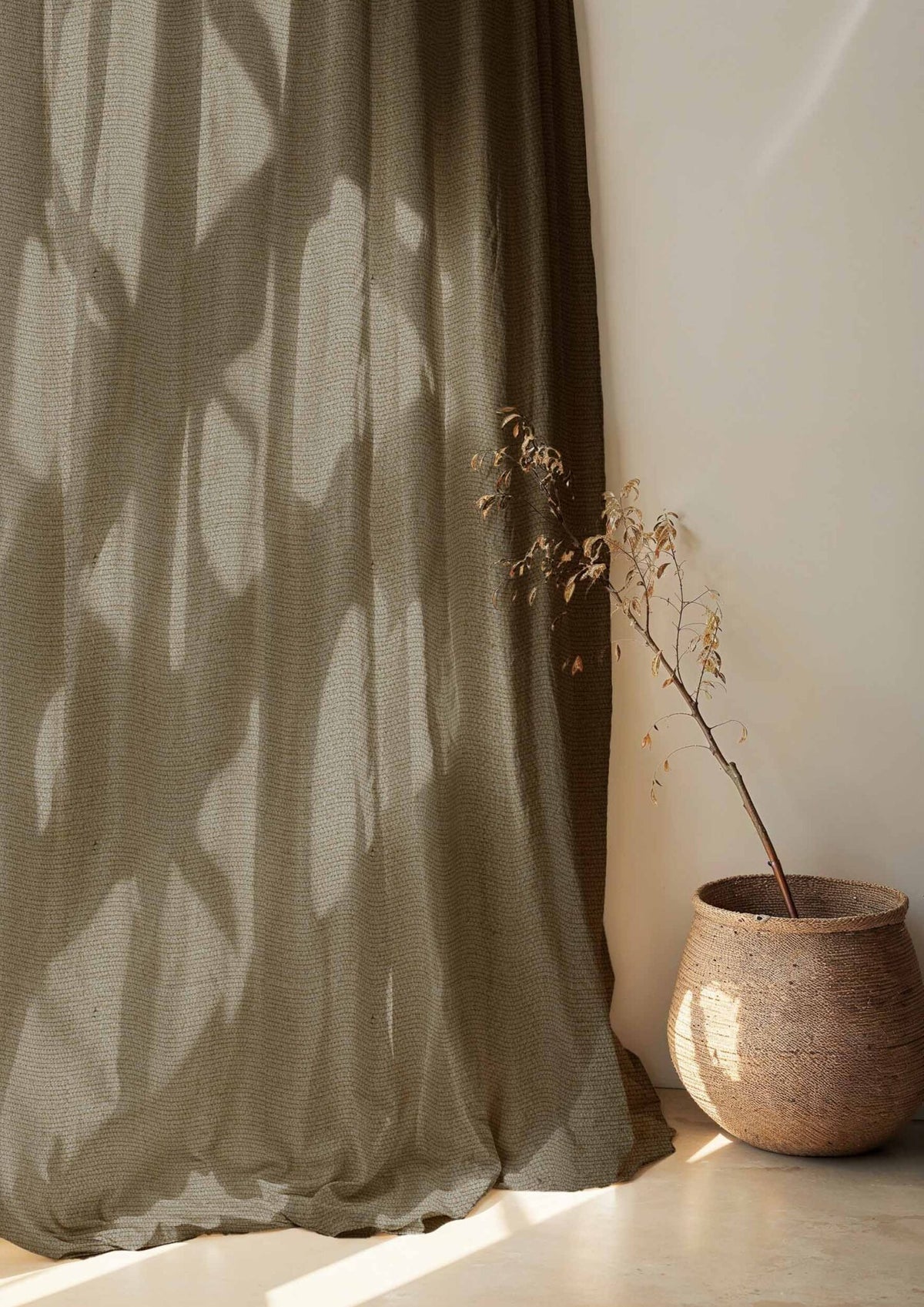 Lightweight Linen fabric by Coordonné in Brown T6484022, shown in a styled room