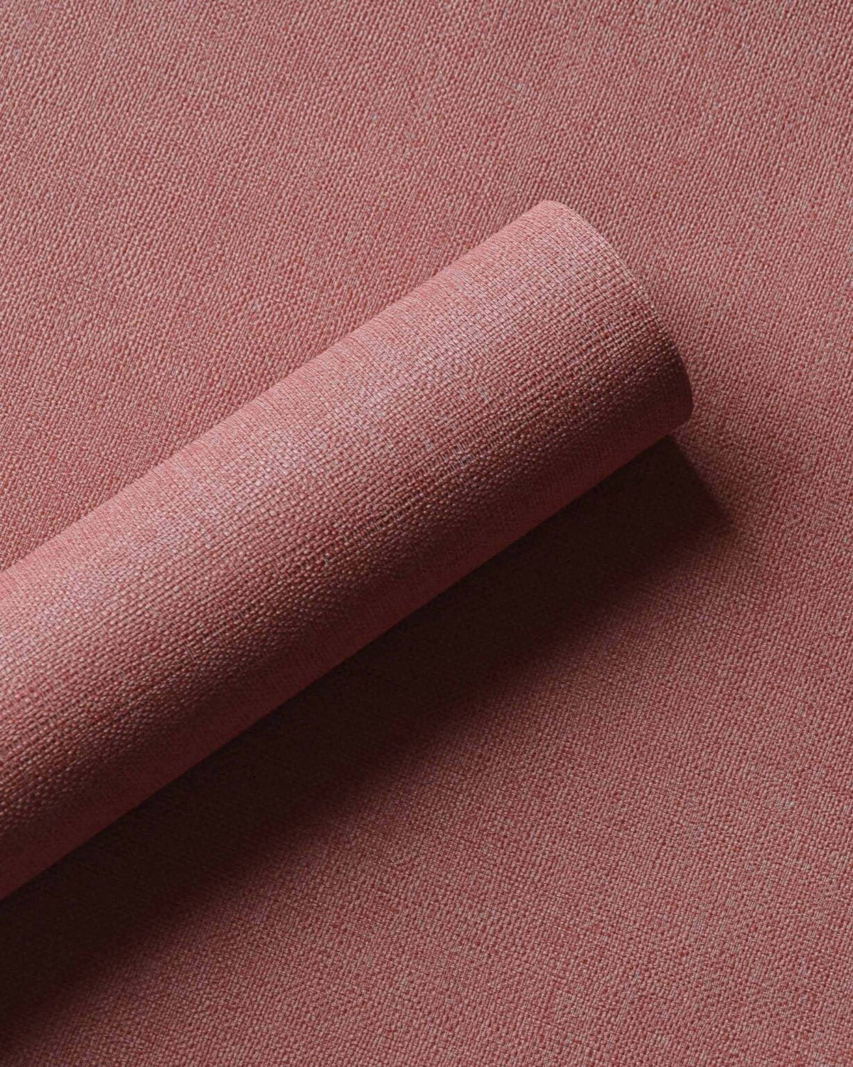 Lin wallpaper by Coordonné in Corail, shown in a styled room