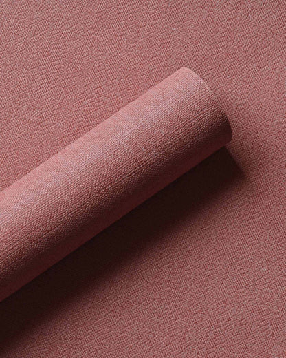 Lin wallpaper by Coordonné in Corail, shown in a styled room
