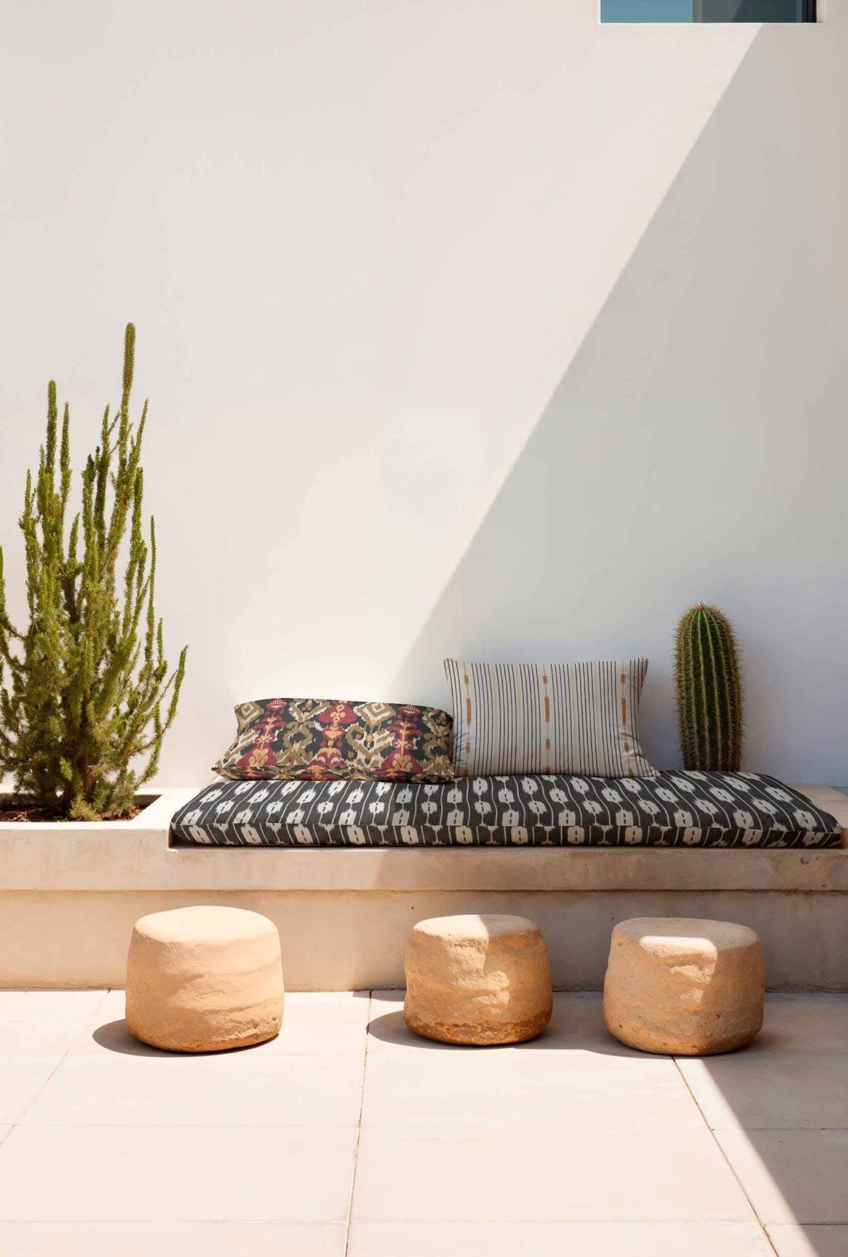 Llengües fabric by Coordonné in Black, shown in a styled room