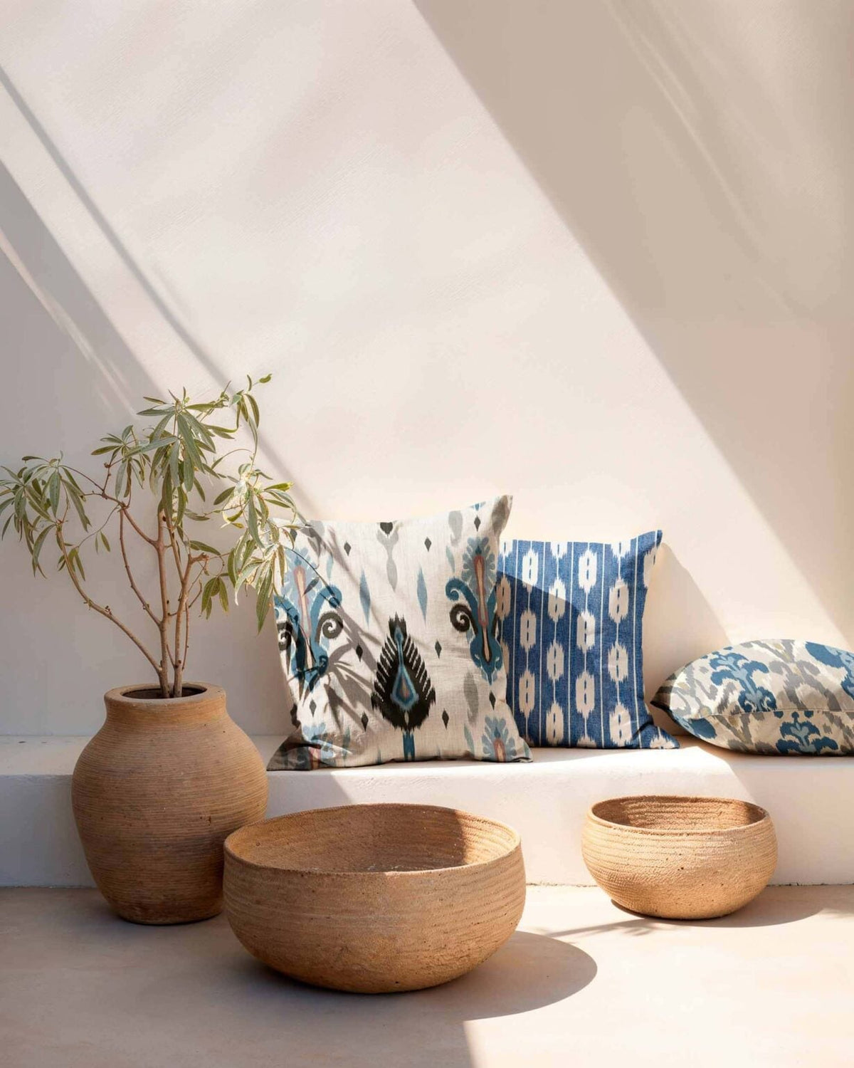 Llengües fabric by Coordonné in Blue, shown in a styled room