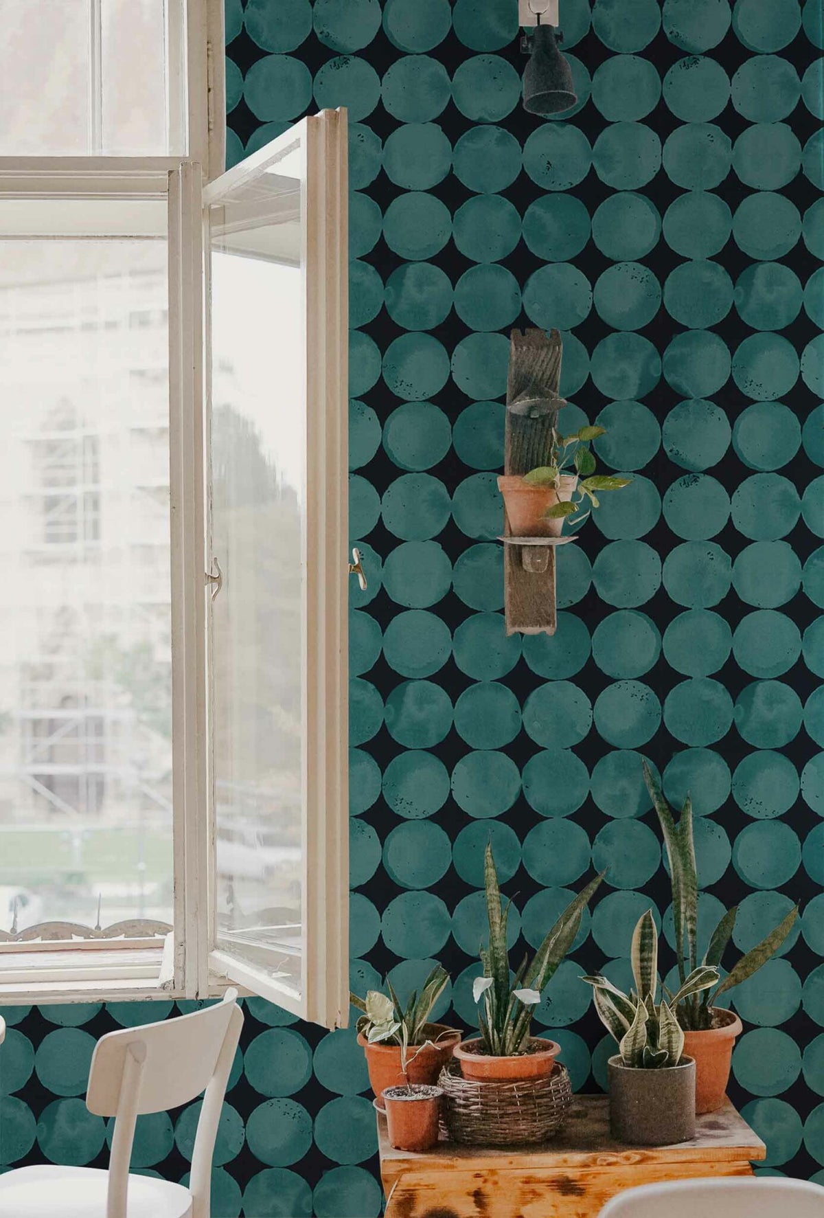Luna Craters wallpaper by Coordonné in Aqua, shown in a styled room