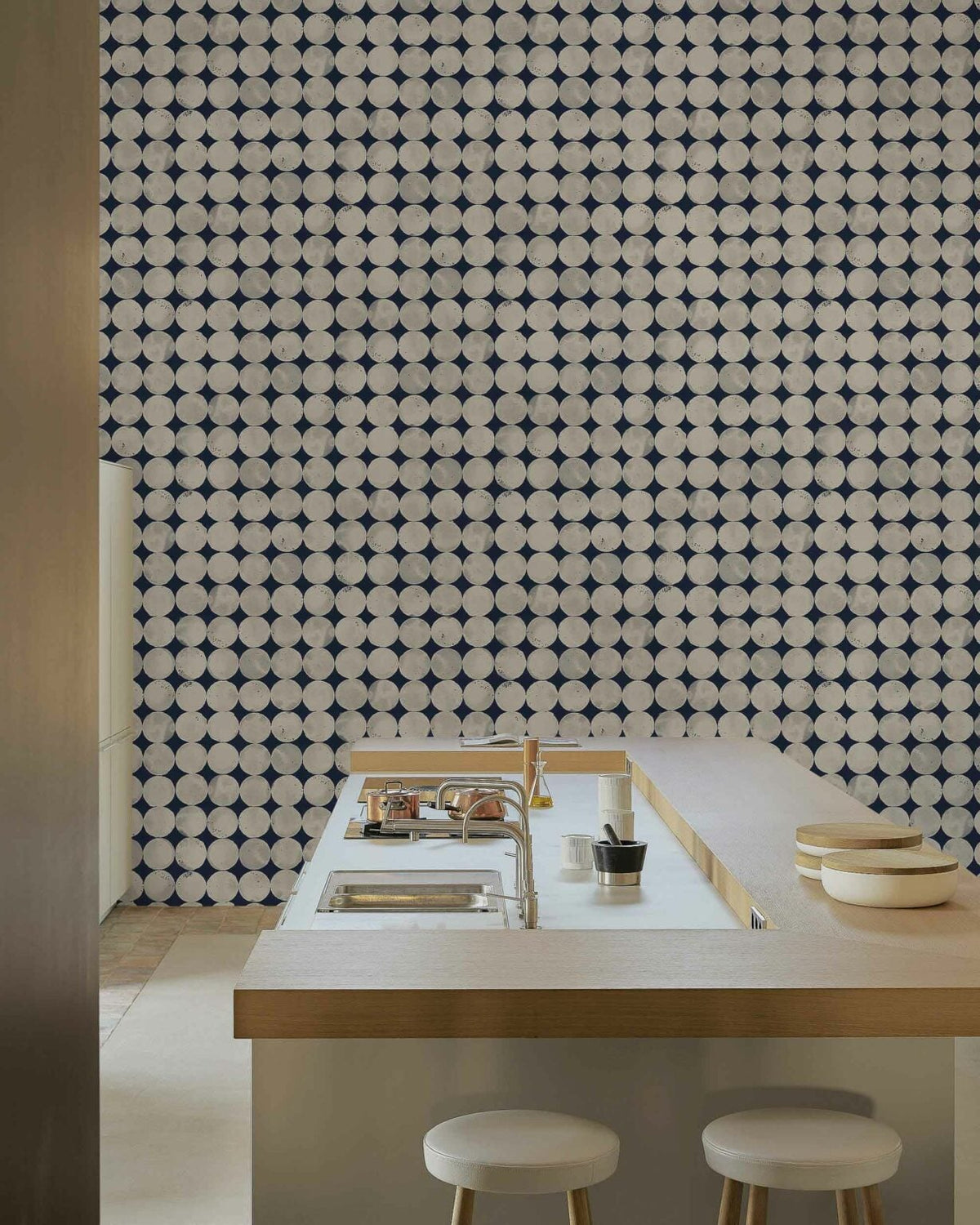 Luna Craters wallpaper by Coordonné in Ice, shown in a styled room