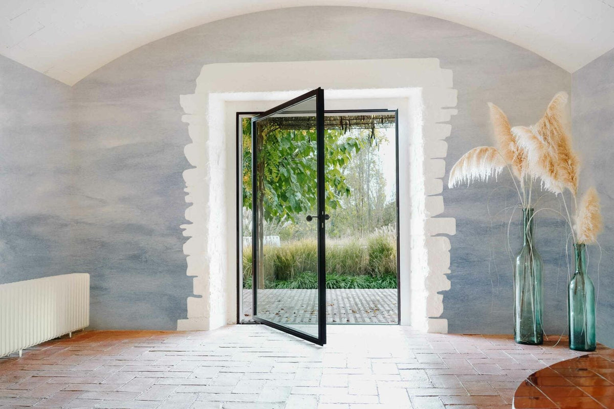 Mara mural by Coordonné in Añil, shown in a styled room