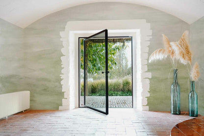 Mara mural by Coordonné in Menta, shown in a styled room