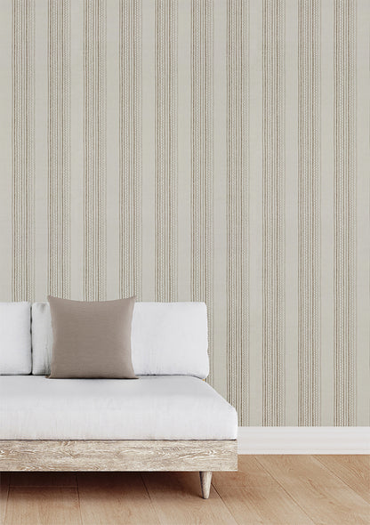 Maritime Stripe Wallpaper by Phillip Jeffries in Batten Brown, shown installed in a room setting