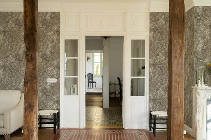 Marta wallpaper by Coordonné in Cacao, shown in a styled room