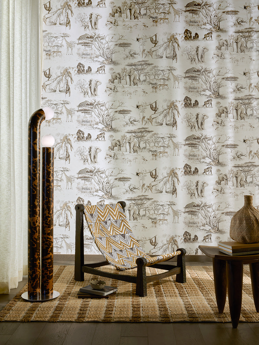 Masai Mara Wallpaper by Pierre Frey shown in a room setting (view 1)