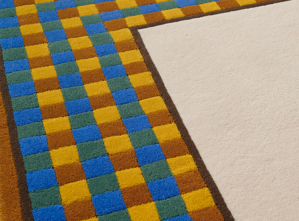 Menkaoure Rug by Pierre Frey shown in a room setting (view 1)