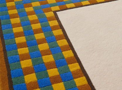 Menkaoure Rug by Pierre Frey shown in a room setting (view 1)