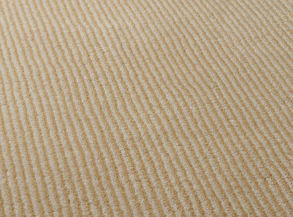 Mont Blanc Rayures Rug by Pierre Frey shown in a room setting (view 1)