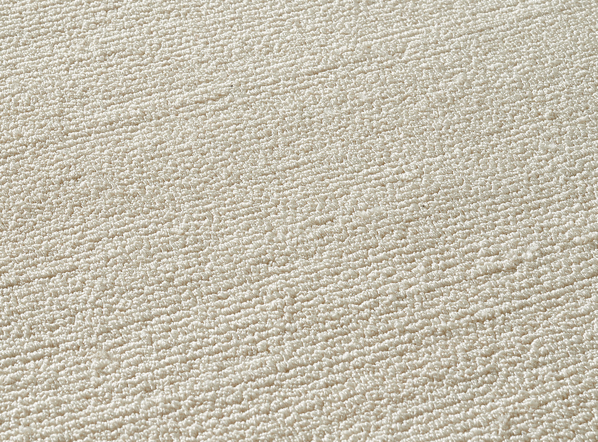 Mont Dana Loop Rug by Pierre Frey shown in a room setting (view 1)