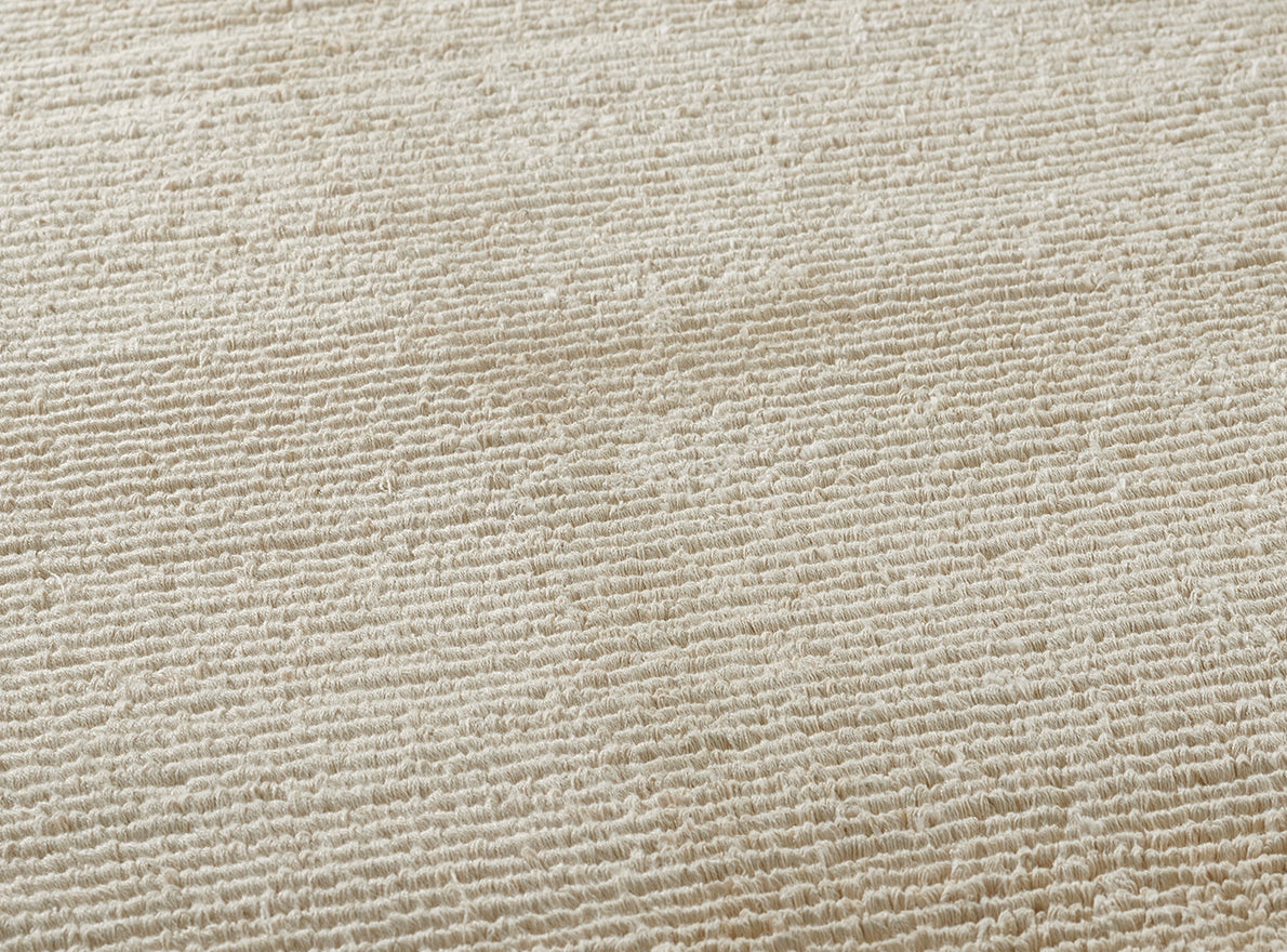 Nalakankar Loop Rug by Pierre Frey shown in a room setting (view 1)