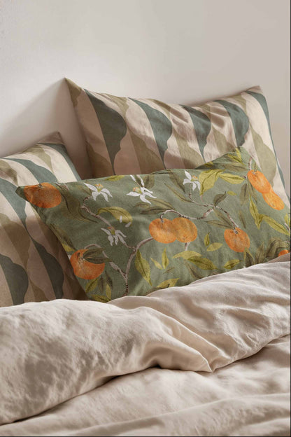 Naranjos fabric by Coordonné in Celadon, shown in a styled room