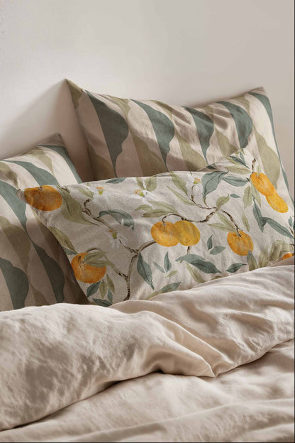 Naranjos fabric by Coordonné in Piedra, shown in a styled room