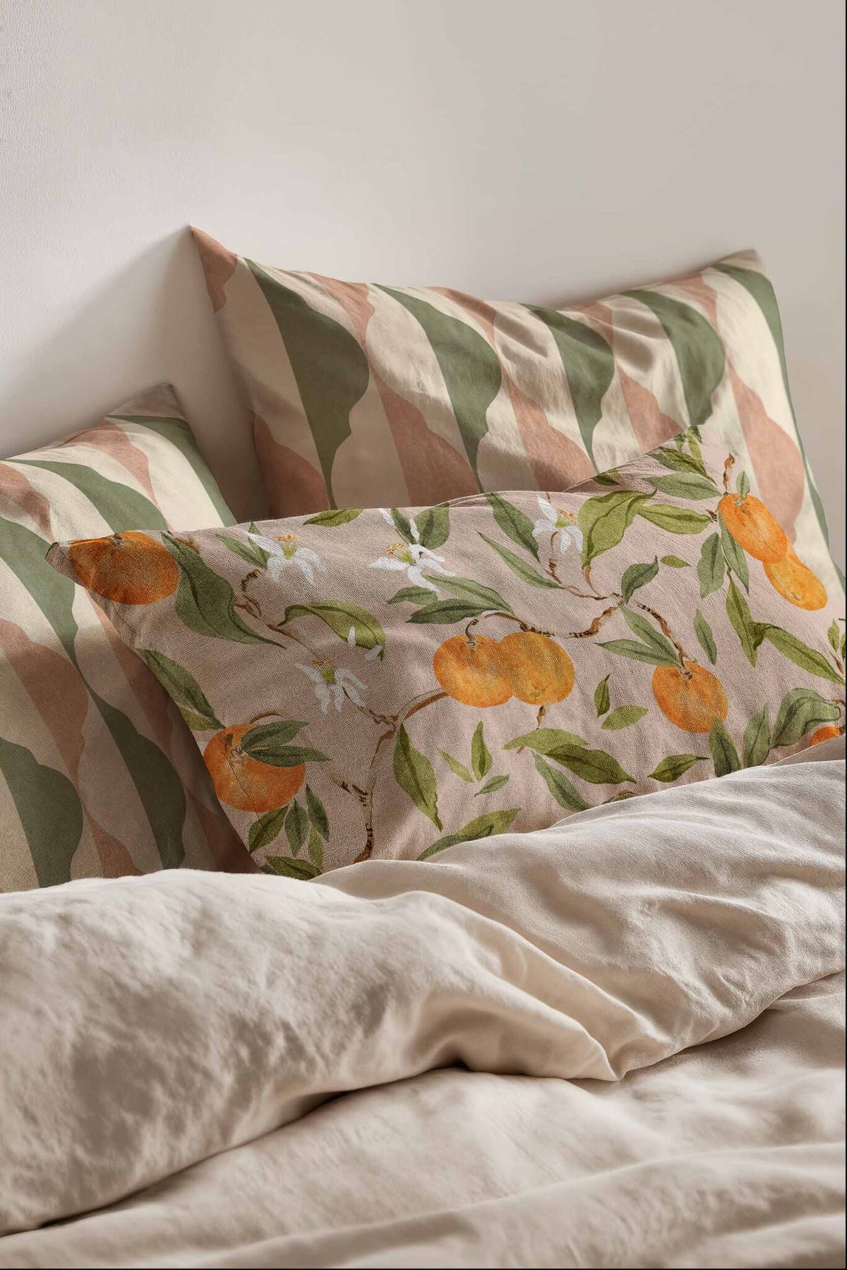 Naranjos fabric by Coordonné in Rosado, shown in a styled room
