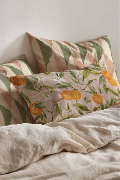 Naranjos fabric by Coordonné in Rosado, shown in a styled room