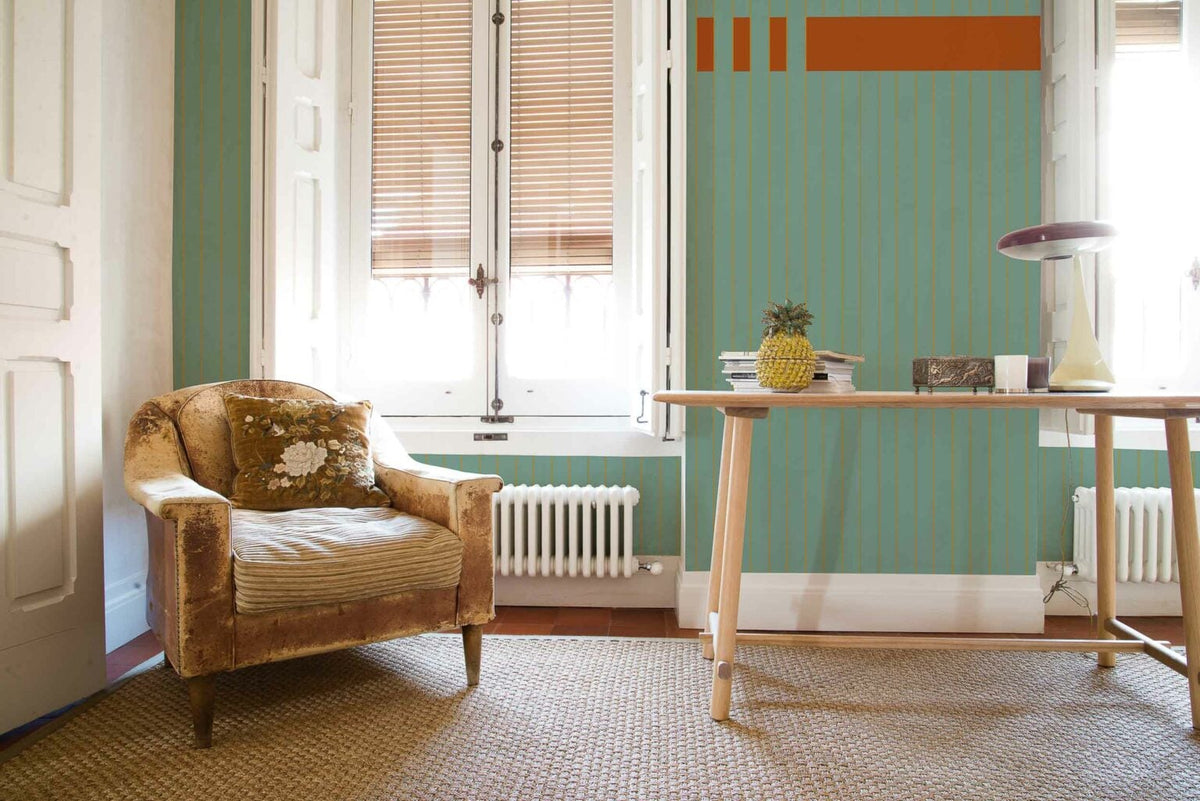 Nascondino mural by Coordonné in Naranja, shown in a styled room