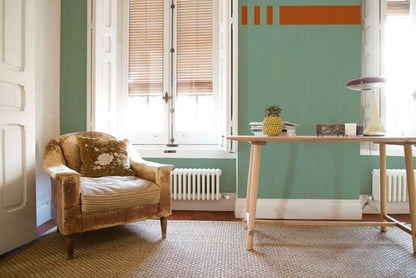 Nascondino mural by Coordonné in Naranja, shown in a styled room
