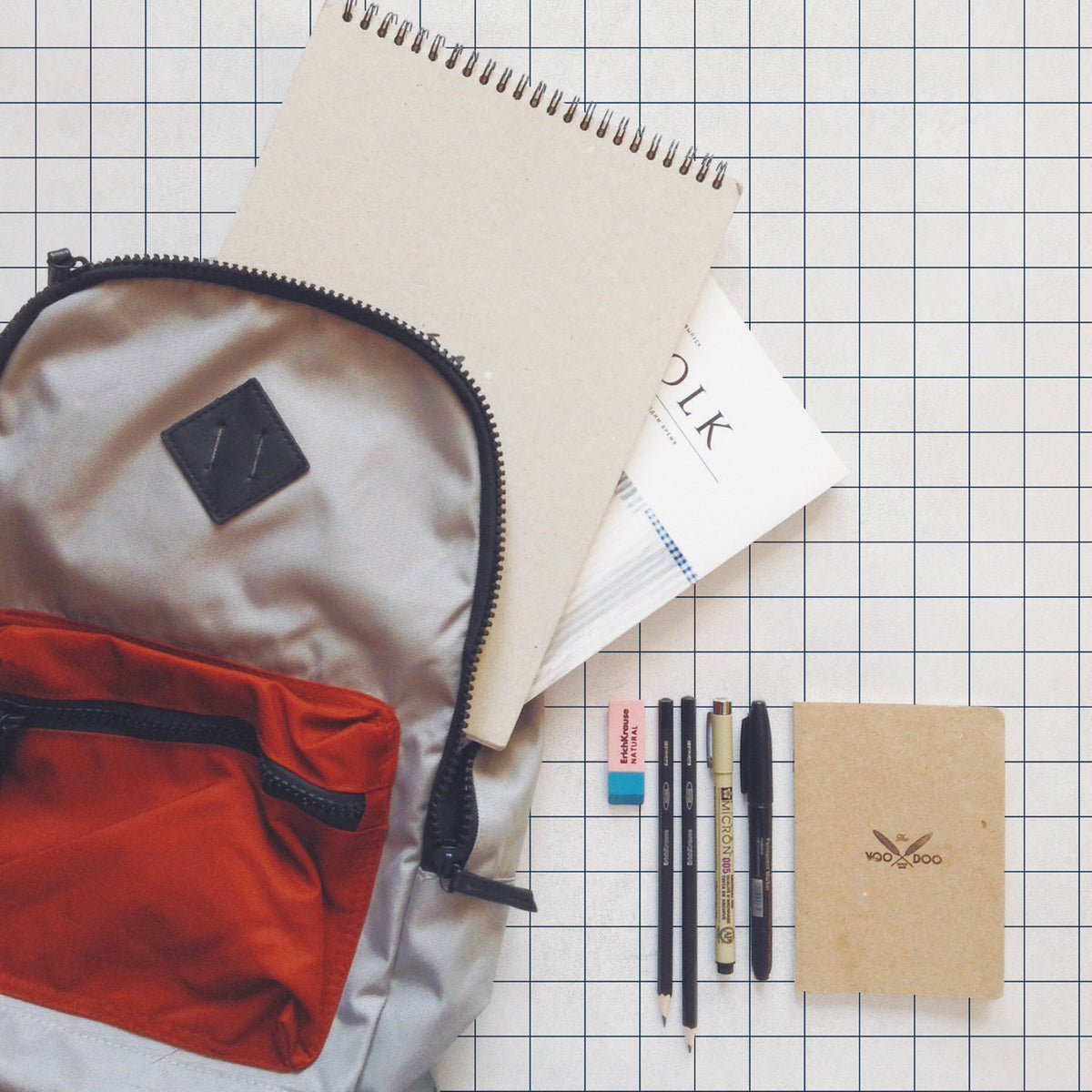Notebook wallpaper by Coordonné in Navy, shown in a styled room