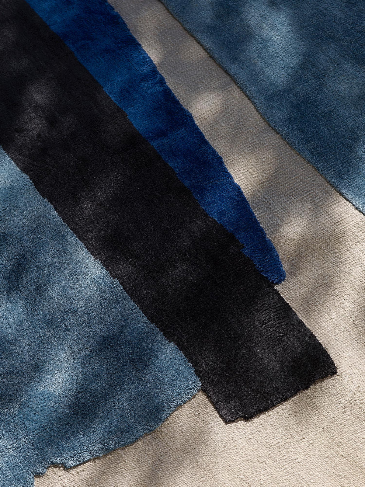 Obsidienne Rug by Pierre Frey shown in a room setting (view 1)