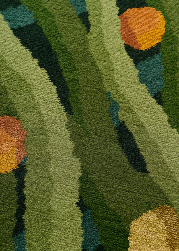 Orangeraie Rug by Pierre Frey shown in a room setting (view 1)