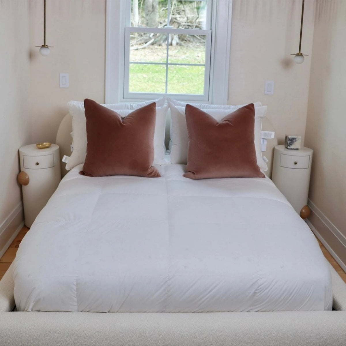 Organa Organic White Goose Down Comforter by Downright, styled on a bed
