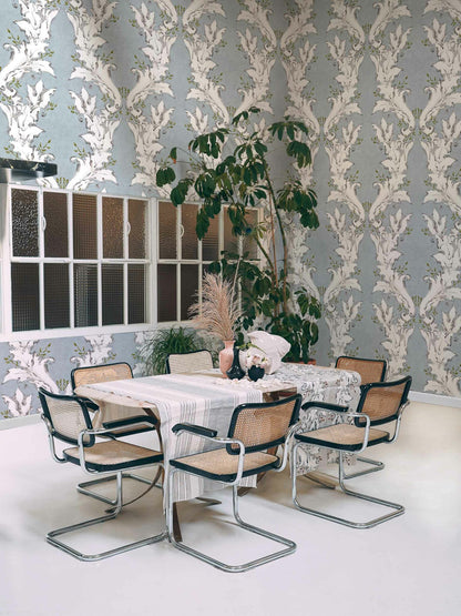 Ornamental wallpaper by Coordonné in Lima, shown in a styled room