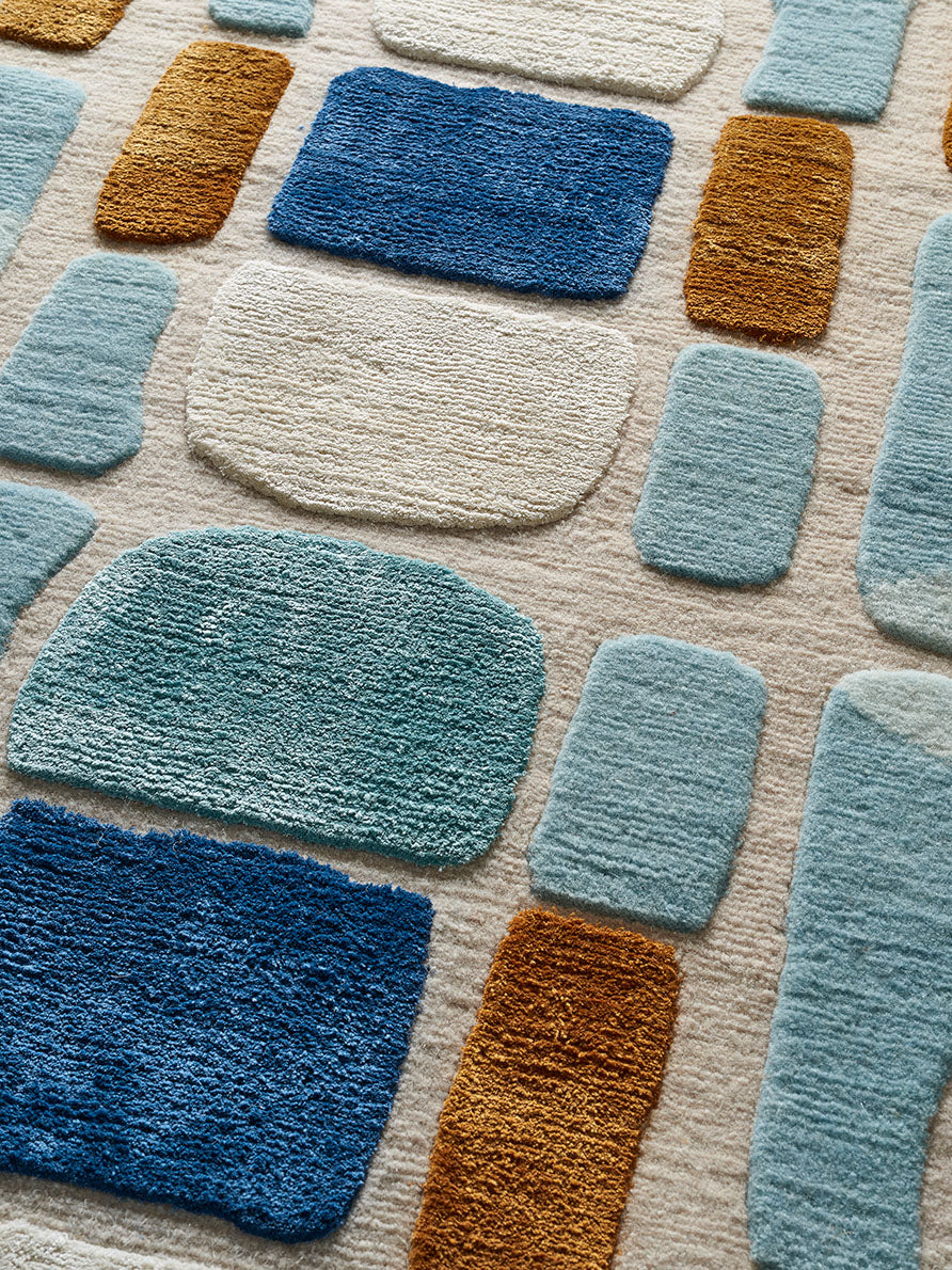 Panya Rug by Pierre Frey shown in a room setting (view 2)