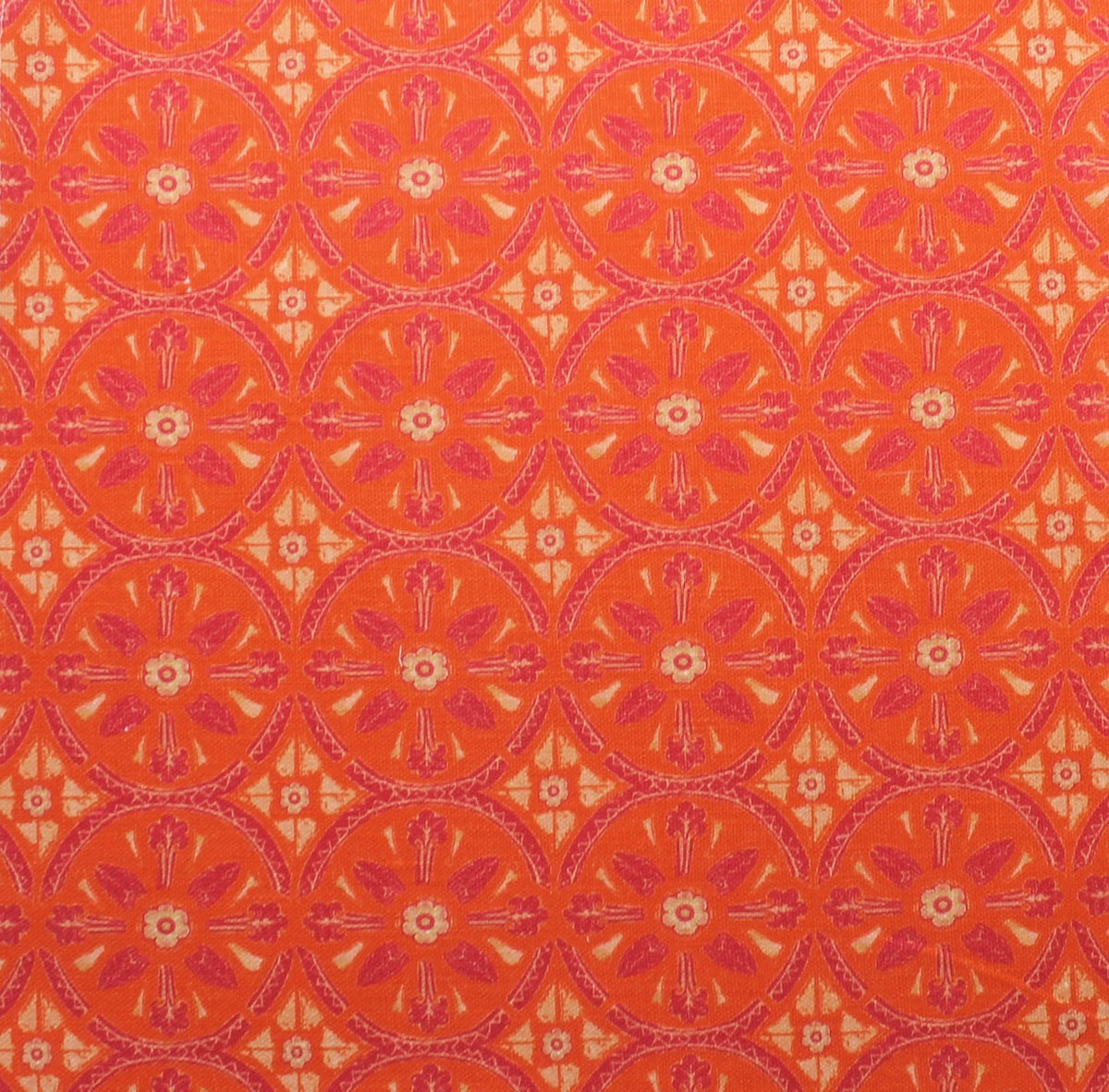 Petite Circle Batik Fabric by Betsy Textiles in Tangerine