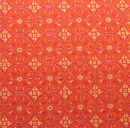 Petite Circle Batik Fabric by Betsy Textiles in Tangerine