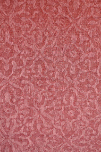 Phaistos fabric by Coordonné in Coral, shown in a styled room