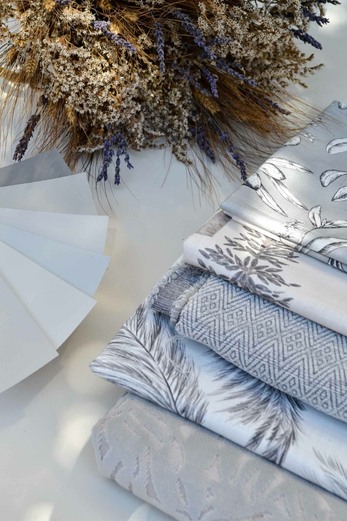 Plumero fabric by Coordonné in Plata, shown in a styled room