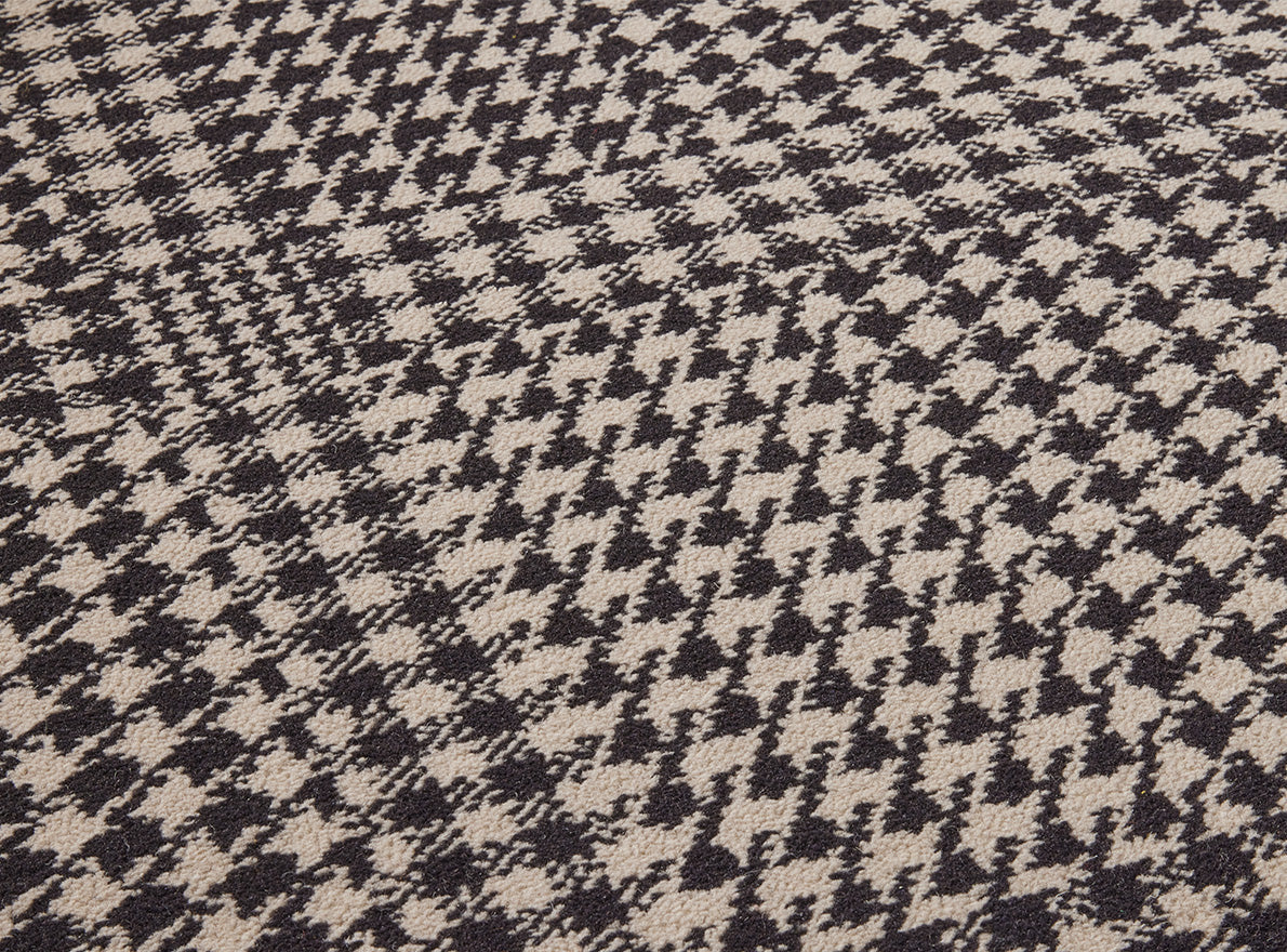 Prince de Galles Rug by Pierre Frey shown in a room setting (view 1)