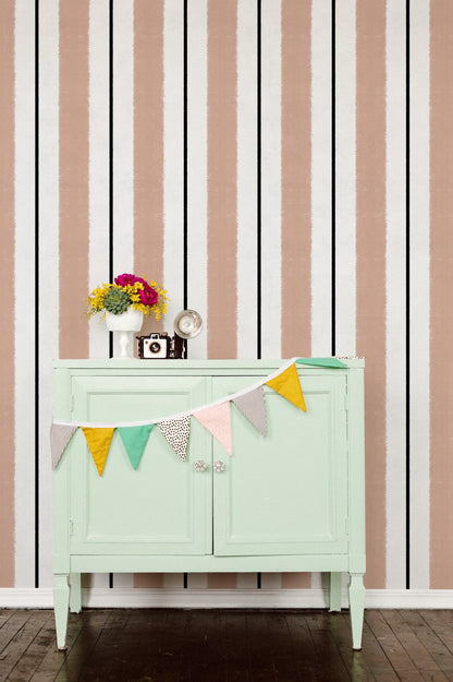 Race wallpaper by Coordonné in Nude, shown in a styled room