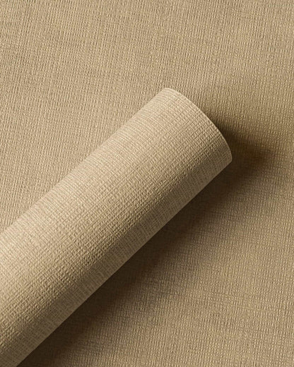 Raphia wallpaper by Coordonné in Ocre, shown in a styled room