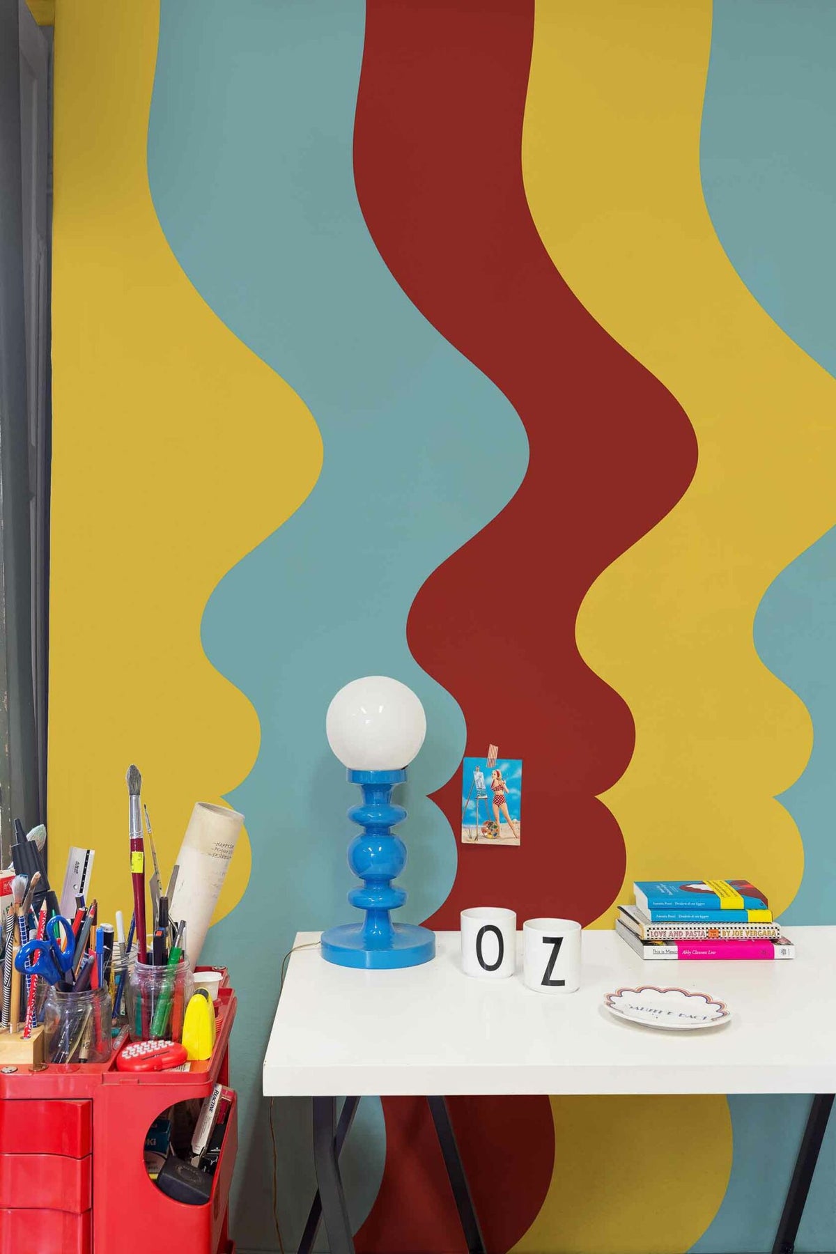 Repetita Iuvant mural by Coordonné in Night Dream, shown in a styled room