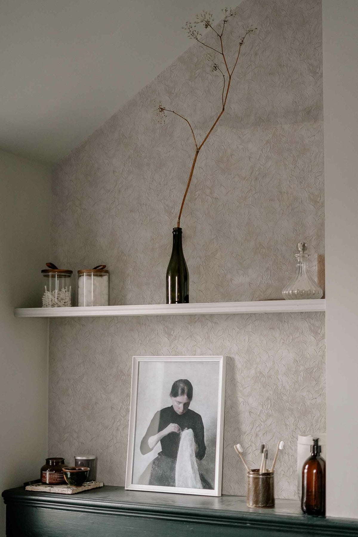 Rob Leaves wallpaper by Coordonné in Dune, shown in a styled room