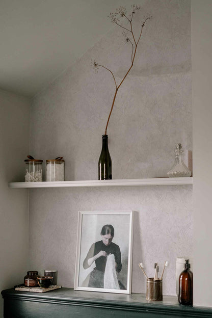 Rob Leaves wallpaper by Coordonné in Ice, shown in a styled room