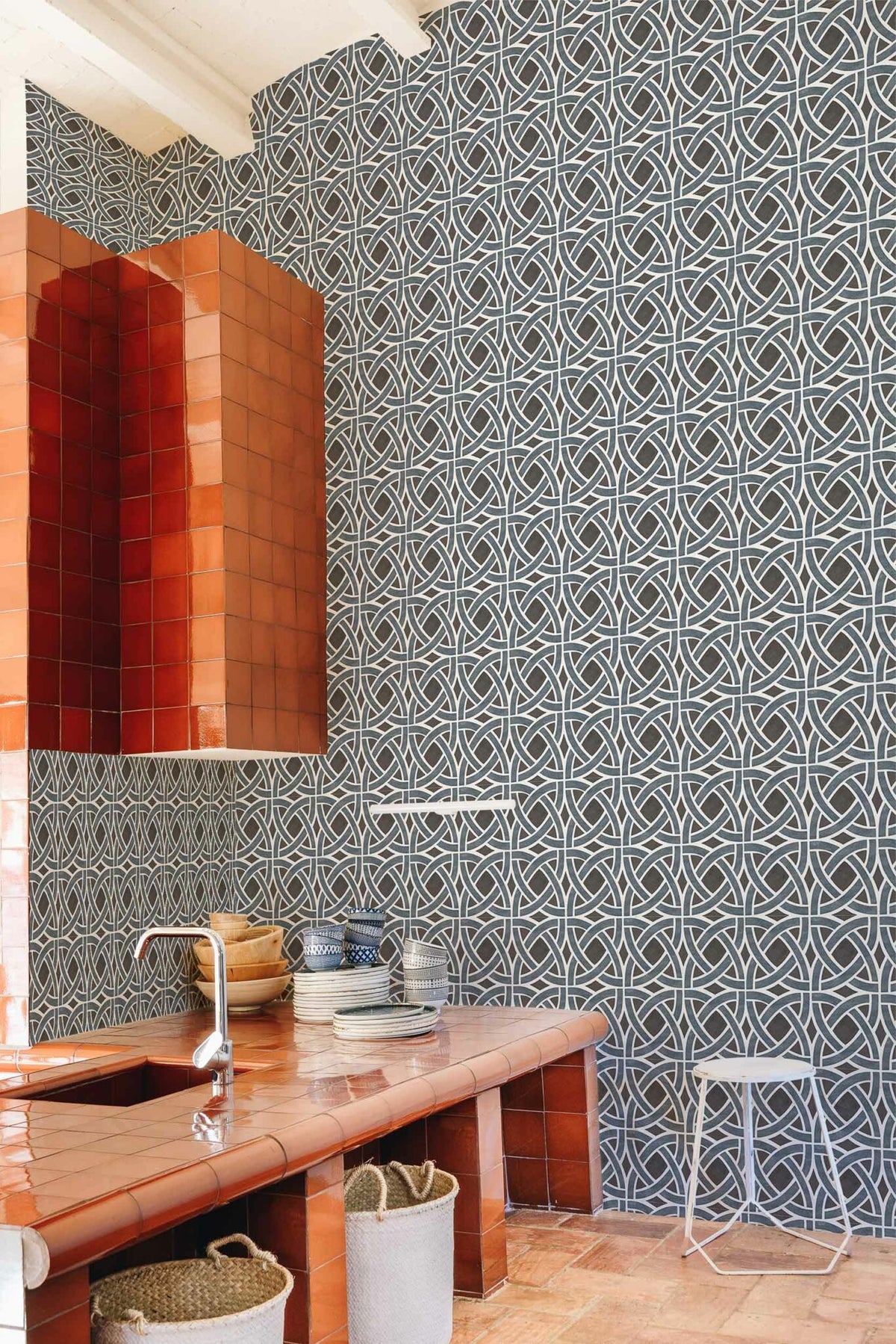 Roots wallpaper by Coordonné in Añil, shown in a styled room