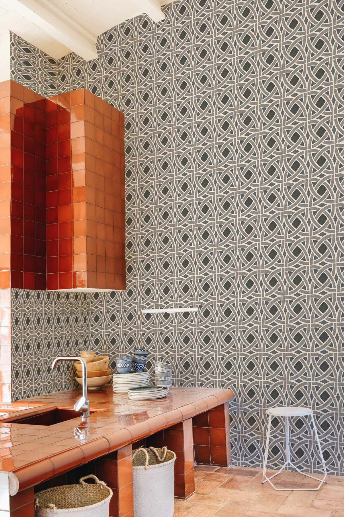 Roots wallpaper by Coordonné in Carbón, shown in a styled room