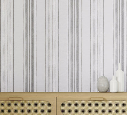 Sailor Stripe Wallpaper by Phillip Jeffries in Backstay Beige, shown installed in a room setting