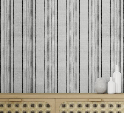 Sailor Stripe Wallpaper by Phillip Jeffries in Ballast Black, shown installed in a room setting